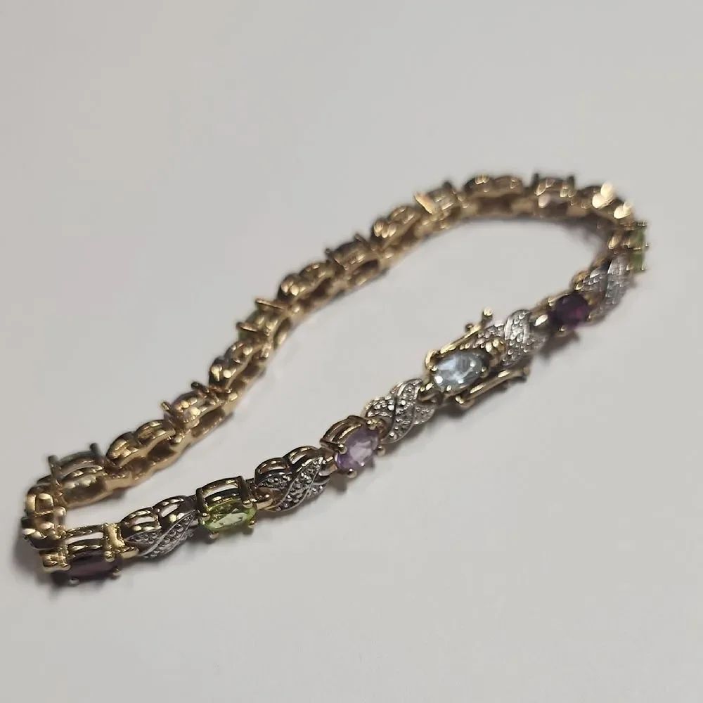 Sterling Silver Gemstone Bracelet Including Peridot, Garnet, Topaz, Amethyst